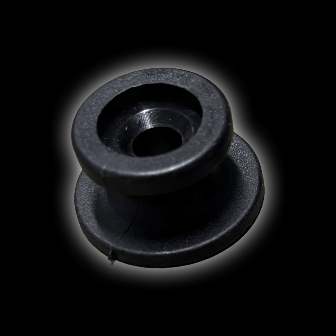 Bungee Retaining Clip, a black clip designed for guttering, showing its circular shape and central hole.
